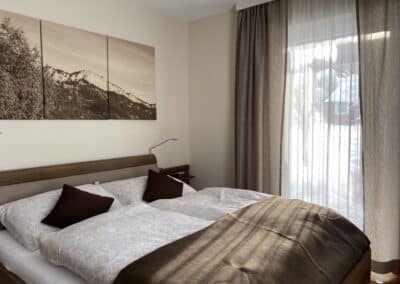 © 2022 Apartment Steinplatte Tirol Schlafzimmer